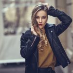 Beautiful young russian girl with balck leather jacket.