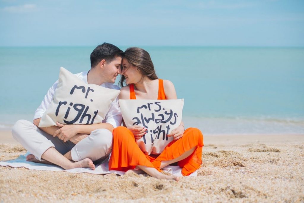 A Couple is sitting on beach