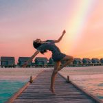 A beautiful girl dancing on the shore of a lake | Blurb geek