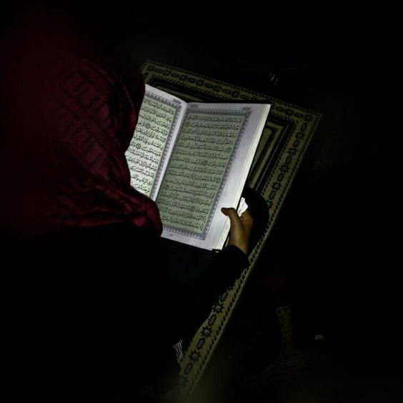 A girl in Hijab Reciting Holy Quran (Hijab Dignity of Muslim Lady)