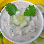 Cucumber-raita-with-cucumber-and-mint-leaves-garnishing | Blurb geek