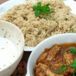 Hyderabadi Chicken Curry and Rice served with yogurt raita | Blurbgeek