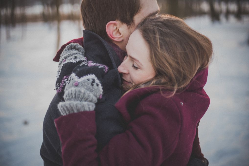 Man hugging with his wife - Stress Relief Activities | Blurbgeek