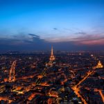 Aerial photo of Eiffel Tower and Paris during the night