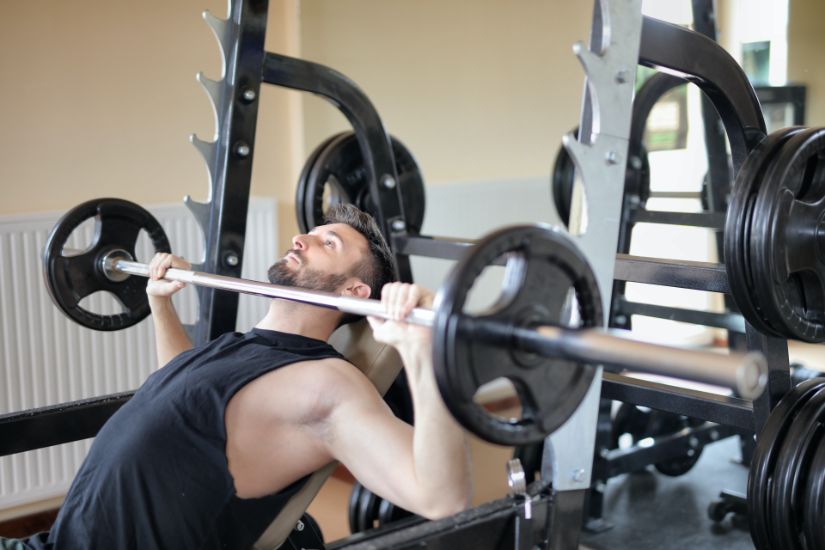 Man Exercising In A Gym | Blurbgeek