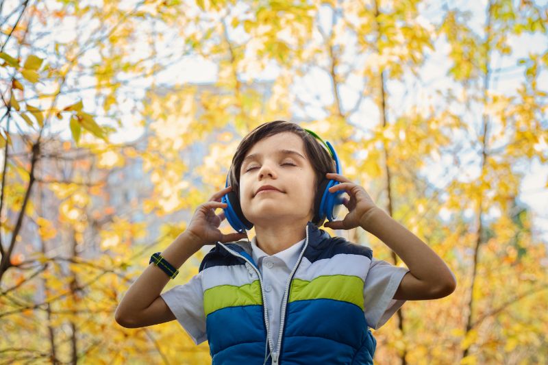Kid Listening To Music | Blurbgeek